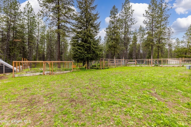 30603 N Riffle Rd, Spirit Lake, ID 83869 - view of yard with a vegetable garden