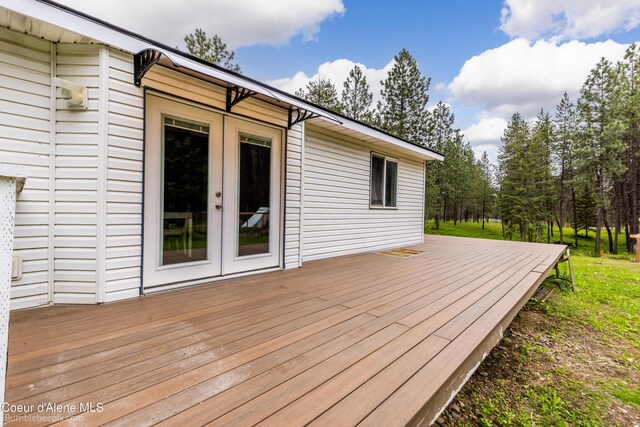 30603 N Riffle Rd, Spirit Lake, ID 83869 - wooden terrace with french doors