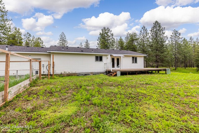 30603 N Riffle Rd, Spirit Lake, ID 83869 - rear view of property with french doors and a deck