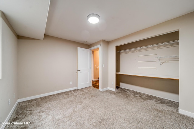30603 N Riffle Rd, Spirit Lake, ID 83869 - unfurnished bedroom with carpet, baseboards, and a closet
