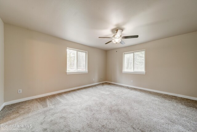 30603 N Riffle Rd, Spirit Lake, ID 83869 - unfurnished room with ceiling fan, carpet, and baseboards