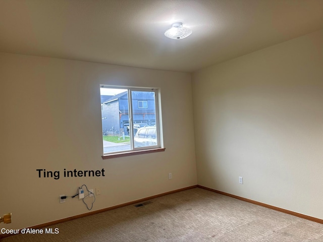 1205 Kinnikinnik Ave, Sandpoint, ID 83864 - empty room featuring light carpet