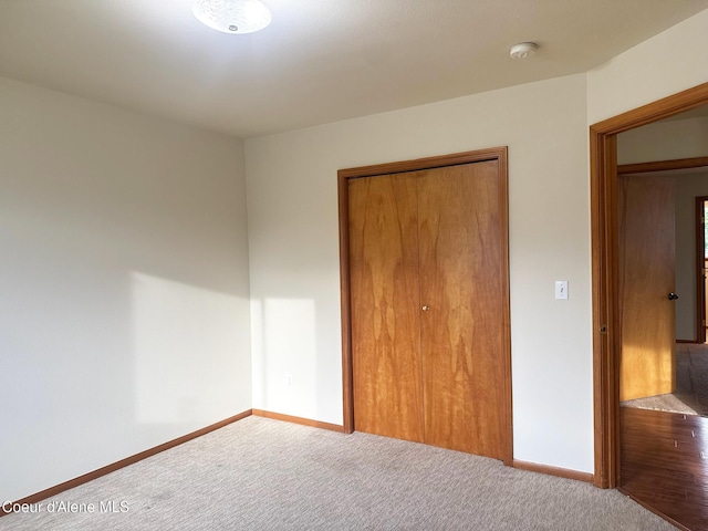1205 Kinnikinnik Ave, Sandpoint, ID 83864 - unfurnished bedroom featuring carpet floors and baseboards