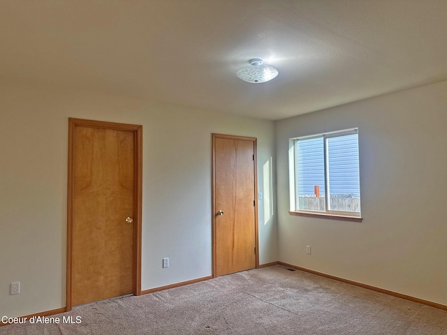 1205 Kinnikinnik Ave, Sandpoint, ID 83864 - unfurnished bedroom with carpet floors