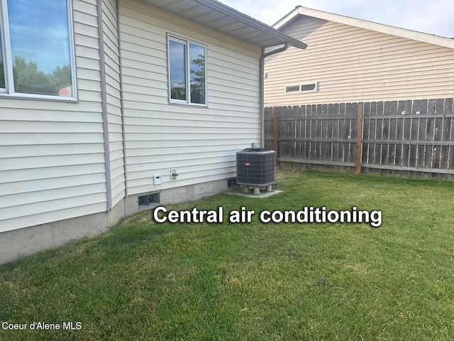 1205 Kinnikinnik Ave, Sandpoint, ID 83864 - view of side of home with a central air condition unit
