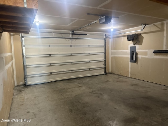 1205 Kinnikinnik Ave, Sandpoint, ID 83864 - garage with electric panel and a garage door opener