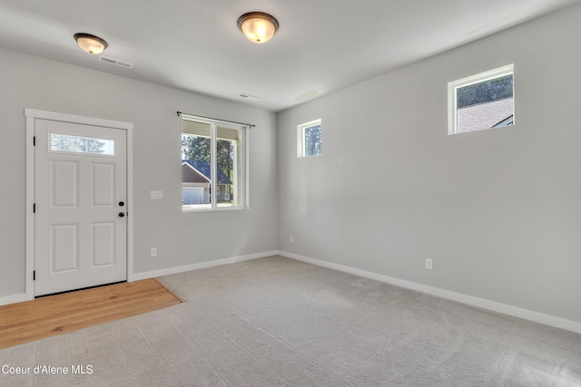 161 White Way, Priest River, ID 83856 - entrance foyer featuring light carpet and baseboards