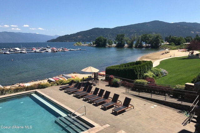 aerial view of a water and mountain view and a pool