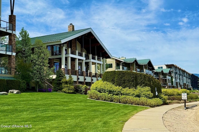 view of community featuring a lawn