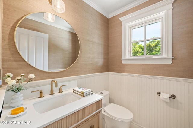 2484 E Woodstone Dr, Hayden, ID 83835 - half bath with toilet, wainscoting, vanity, and crown molding