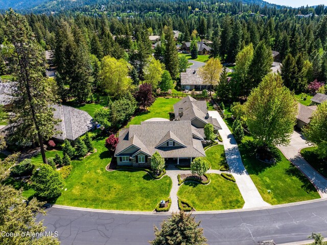 2484 E Woodstone Dr, Hayden, ID 83835 - aerial view of property and surrounding area featuring a forest