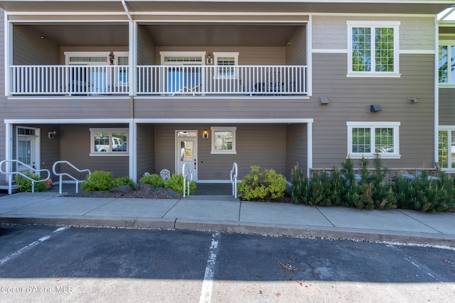4445 W Greenchain Loop Unit 2, Coeur Dalene, ID 83814 - view of building exterior with uncovered parking