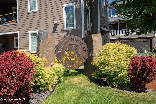 4445 W Greenchain Loop Unit 2, Coeur Dalene, ID 83814 - view of side of home featuring an attached garage