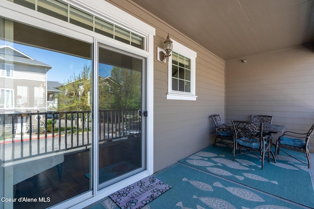 4445 W Greenchain Loop Unit 2, Coeur Dalene, ID 83814 - property entrance featuring outdoor dining area