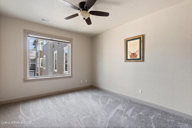 4445 W Greenchain Loop Unit 2, Coeur Dalene, ID 83814 - unfurnished room featuring carpet, a ceiling fan, and baseboards
