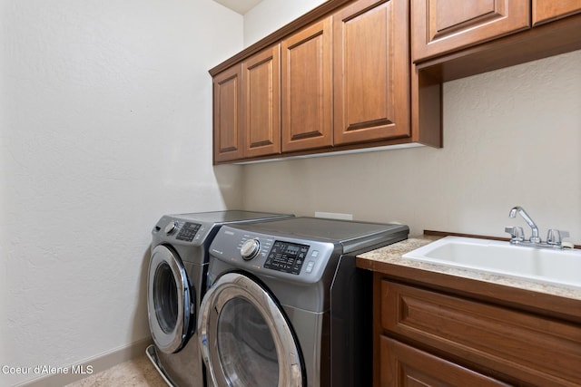 4445 W Greenchain Loop Unit 2, Coeur Dalene, ID 83814 - laundry room featuring separate washer and dryer and cabinet space