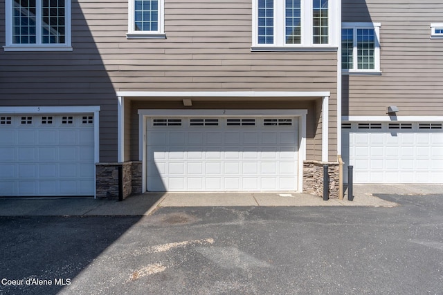 4445 W Greenchain Loop Unit 2, Coeur Dalene, ID 83814 - view of garage