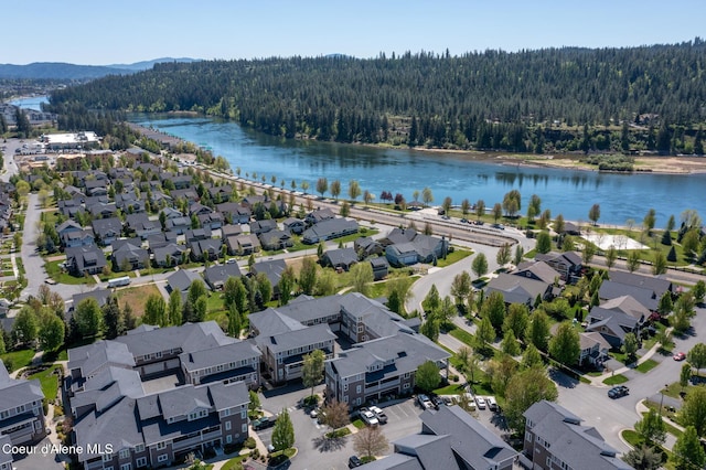 4445 W Greenchain Loop Unit 2, Coeur Dalene, ID 83814 - aerial view of residential area with a forest and a water and mountain view