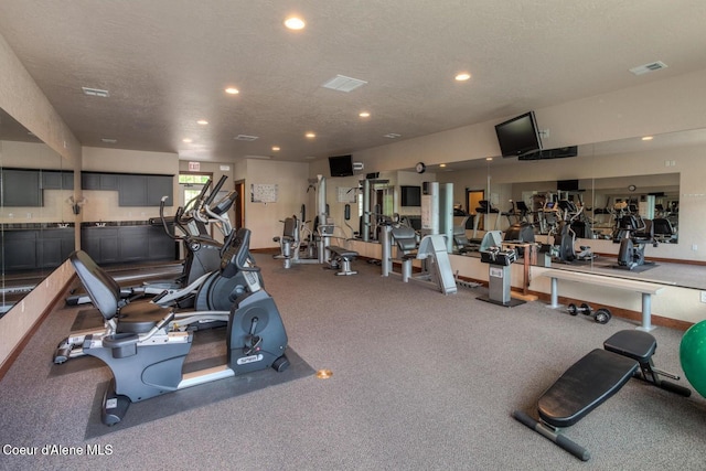 4445 W Greenchain Loop Unit 2, Coeur Dalene, ID 83814 - exercise room with recessed lighting and a textured ceiling