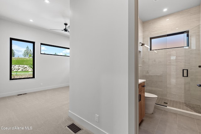 2867 W Lumber Ln, Coeur Dalene, ID 83814 - bathroom with a stall shower, vanity, a ceiling fan, baseboards, and recessed lighting