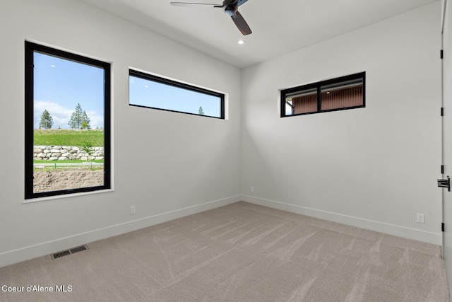 2867 W Lumber Ln, Coeur Dalene, ID 83814 - spare room featuring a ceiling fan, light carpet, baseboards, and recessed lighting