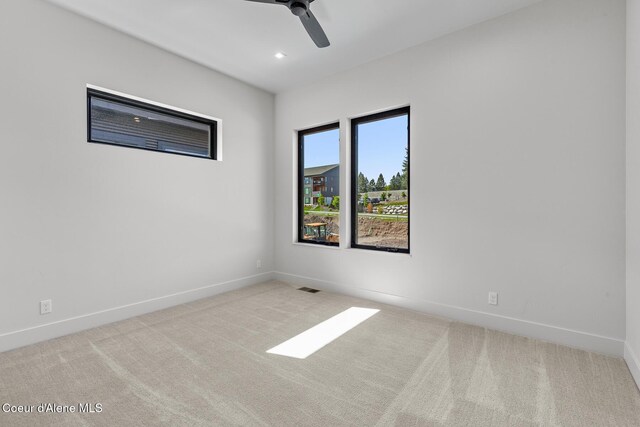 2867 W Lumber Ln, Coeur Dalene, ID 83814 - carpeted spare room with ceiling fan and baseboards