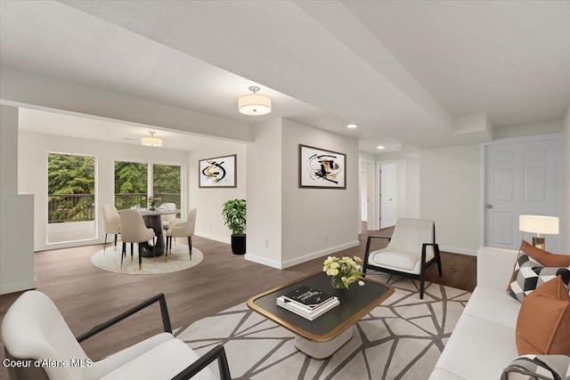 1303 N Cherrywood Dr, Coeur Dalene, ID 83814 - living room featuring baseboards, wood finished floors, and recessed lighting