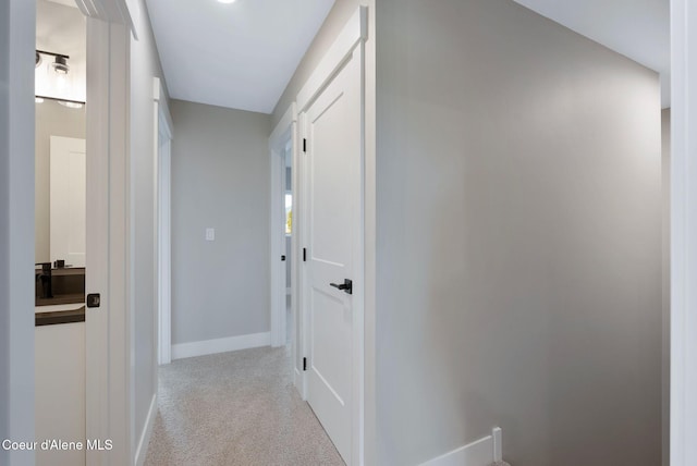 1678 Onyx Ct, Sandpoint, ID 83864 - corridor featuring light colored carpet and baseboards