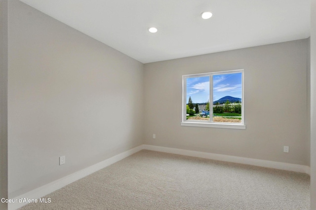 1678 Onyx Ct, Sandpoint, ID 83864 - carpeted spare room with baseboards and recessed lighting