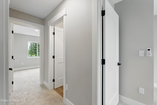 1678 Onyx Ct, Sandpoint, ID 83864 - hall featuring light carpet and baseboards