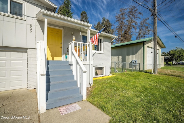 837 N 19th St, Coeur Dalene, ID 83814 - property entrance featuring a garage and brick siding