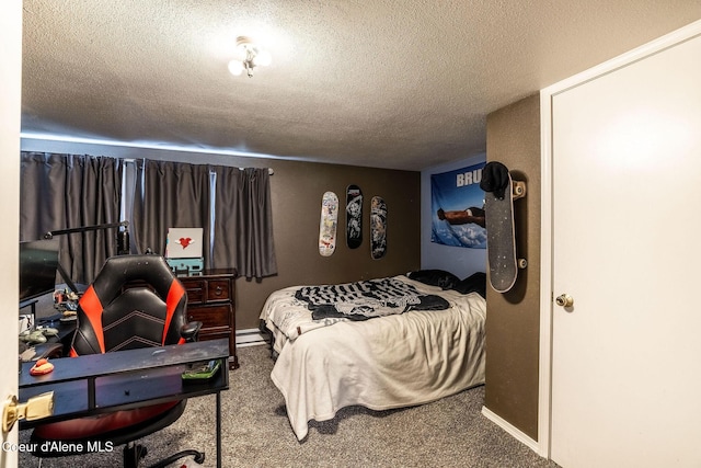 837 N 19th St, Coeur Dalene, ID 83814 - carpeted bedroom featuring a textured ceiling, baseboard heating, and baseboards