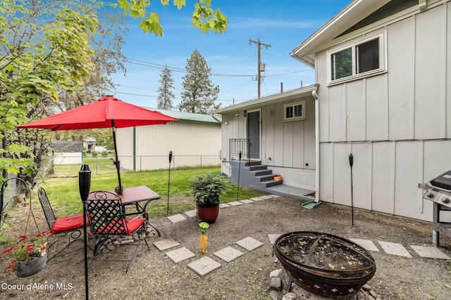 837 N 19th St, Coeur Dalene, ID 83814 - view of patio featuring an outdoor fire pit and grilling area