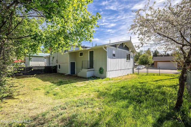 837 N 19th St, Coeur Dalene, ID 83814 - back of property with board and batten siding