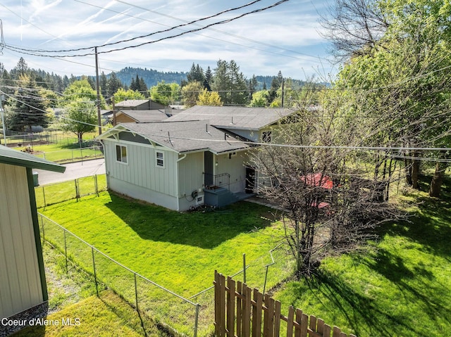 837 N 19th St, Coeur Dalene, ID 83814 - rear view of property featuring roof with shingles