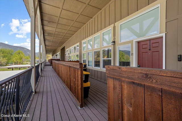 wooden terrace featuring a mountain view