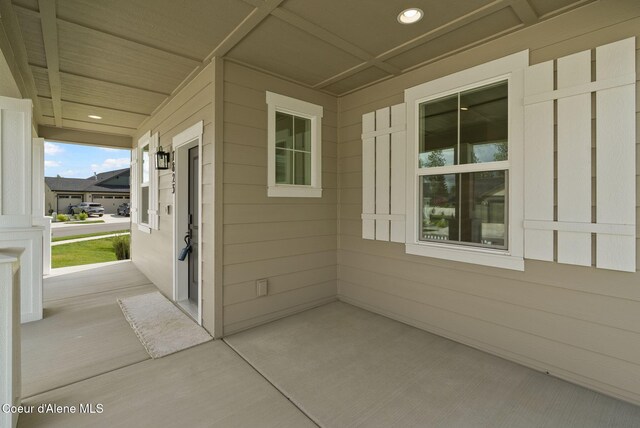 7823 N Girard Cir, Coeur Dalene, ID 83815 - view of patio with a porch