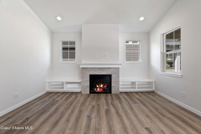 7823 N Girard Cir, Coeur Dalene, ID 83815 - unfurnished living room with a fireplace, baseboards, wood finished floors, and recessed lighting