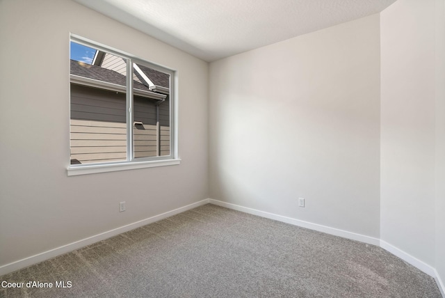 7823 N Girard Cir, Coeur Dalene, ID 83815 - carpeted empty room featuring baseboards
