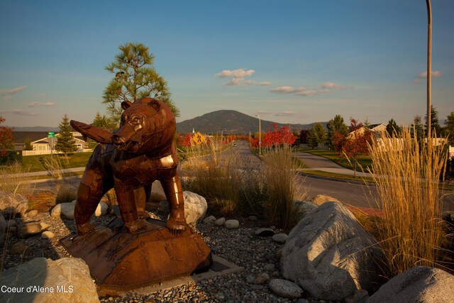7823 N Girard Cir, Coeur Dalene, ID 83815 - yard at dusk with a mountain view