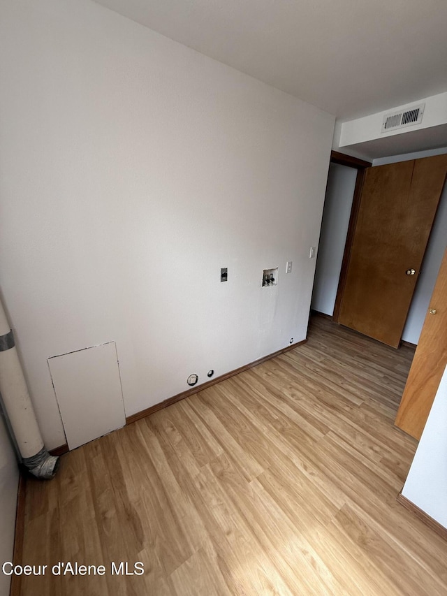 5188 E Woodland Dr, Post Falls, ID 83854 - empty room with light wood-style floors