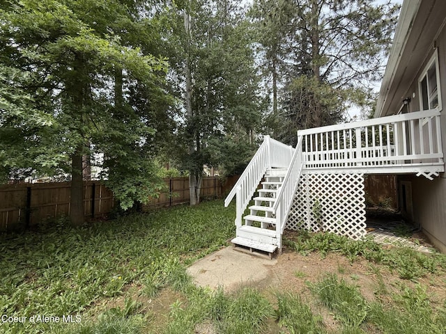 5188 E Woodland Dr, Post Falls, ID 83854 - view of yard featuring stairway and a deck