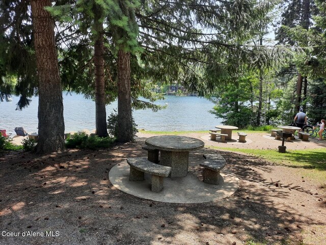 5188 E Woodland Dr, Post Falls, ID 83854 - view of yard with a fire pit and a water view