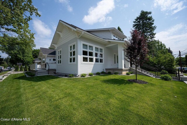 215 W Foster Ave, Coeur Dalene, ID 83814 - view of side of property featuring a lawn