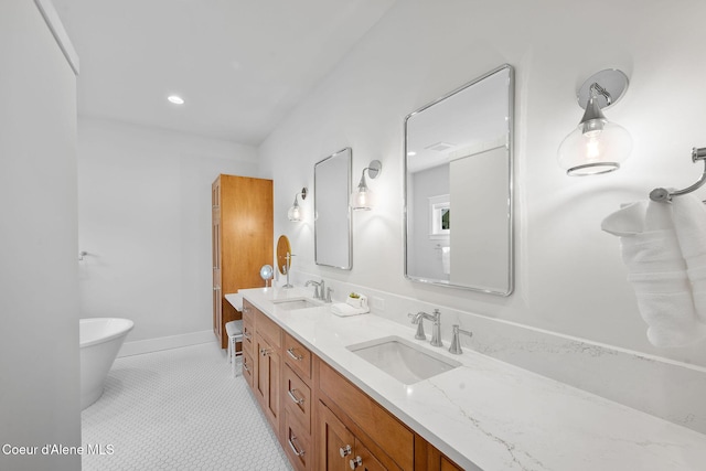 215 W Foster Ave, Coeur Dalene, ID 83814 - full bath with double vanity, a soaking tub, baseboards, and recessed lighting
