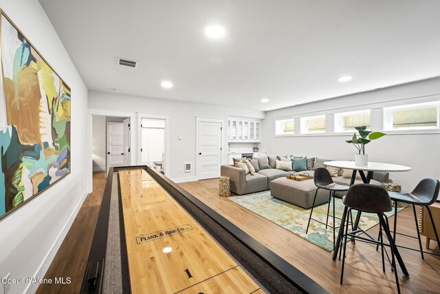 215 W Foster Ave, Coeur Dalene, ID 83814 - living room featuring wood finished floors, recessed lighting, and baseboards