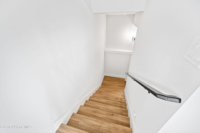 215 W Foster Ave, Coeur Dalene, ID 83814 - stairs with baseboards and wood finished floors