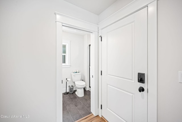 215 W Foster Ave, Coeur Dalene, ID 83814 - bathroom with toilet and baseboards
