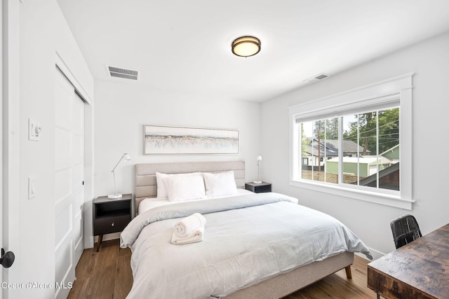 215 W Foster Ave, Coeur Dalene, ID 83814 - bedroom with a closet and wood finished floors