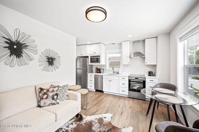 215 W Foster Ave, Coeur Dalene, ID 83814 - living area featuring light wood finished floors and recessed lighting